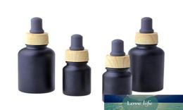10ml 30ml Matte black glass essential oil bottles Glass Dropper Vials Cosmetic Containers Plastic Wood grain lids5860262