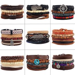 4pcsset Handmade Boho Gypsy Hippie Black Leather Rope Cord Wing Hand Leaves Compass Charm Stackable Wrap Bracelets for Man8261735