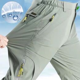 SFABL 5XL Summer Quick Dry Hiking Pants Men Stretch Waterproof Tactical Pants Zipper Pockets Trousers Lightweight Fishing Pants 240412