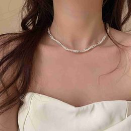 Featuring niche designs silver and pearl double layered entangled necklaces with a high-end feel layered collarbone necklaces versatile and light luxury Instagram