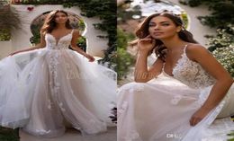 2022 Vintage Spaghetti Straps Lace A Line Wedding Dresses Tulle Applique Ruffles Court Train Garden Wedding Bridal Gowns BM16399501372