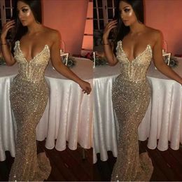 Luxury Shiny Light Champagne Prom Dresses Sexy Bling Deep V Neck Evening Gowns Mermaid Sleeveless Long Sweep Train Beading Arabic Formal Party Gowns For Women