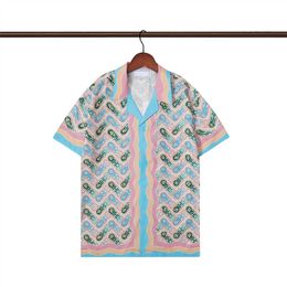 Summer men's T-shirt Designer print button up Cardigan Casual Loose version Polo Short sleeve Hawaiian lapel Top Fashion Men's Swim Shirt Series Beach shirt Size M-3XL #35