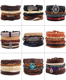 4pcsset Handmade Boho Gypsy Hippie Black Leather Rope Cord Wing Hand Leaves Compass Charm Stackable Wrap Bracelets for Man6411872