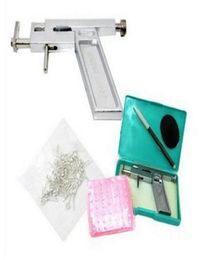 NEW ARRIVAL Professional Ear Body Nose Piercing Gun Machine Tool Kit Set 98Pcs Steel Studs Piercing the Ear Guns Iron Suit 1369335