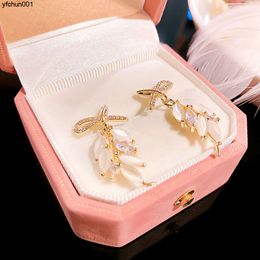 Da Mai Sui Earrings Female Cats Eye Stone Designer Leaf Zhang Zifeng Same Style Light Luxury and High End Sense