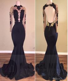 2018 New African Black and Gold Mermaid Prom Dresses Long High Neck Satin Sexy See Through Open Back Long Sleeve Prom Evening Gown5643856