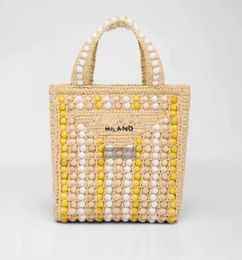 Top Famous Brand Straw Bag Small Net Red Envelope Women039s Grass Woven Wooden Bear Portable Beach Bag Sweet Holiday Shopping B8034575