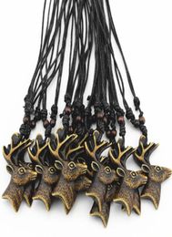 Jewelry Whole 12PCSLOT 12pcs Yak Bone Carved Christmas Deer Pendant Reindeer Head Necklace Choker Lucky presents christmas gi3652998