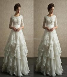 Half Sleeves Wedding Dresses Modest Wedding Gowns with Lace Applique Organza Floor Length Beach Bridal Dress China3360989