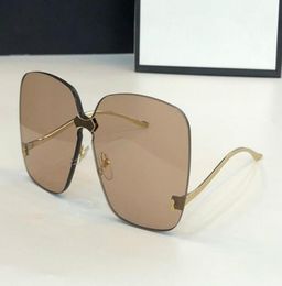 New 0352 Designer Sunglasses For Women Fashion Wrap Sunglass Frameless Coating Mirror Lens Carbon Fiber Legs Summer Style top qual3649992