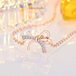 New light luxury design bow hollow out Necklace women ins simple and versatile diamond inlaid clavicle chain net red jewelry