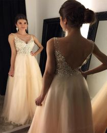 2020 Sexy Peach A Line Prom Dresses V Neck Lace Appliques Crystal Beaded Sleeveless Tulle Open Back Formal Party Dress Evening Gow3244409