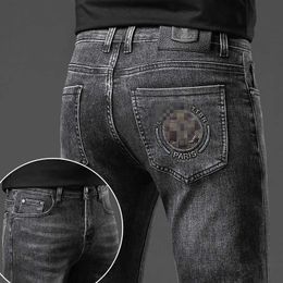 Luxury Men's Jeans designer New for Light Luxury Korean Edition Thick Elastic Feet Slim Fit Youth Blue and Black Pants