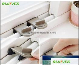 Other Household Sundries 1Pc Move Window Child Safety Lock Sliding Windows Kids Cabinet Locks Door Stopper Security Sash Drop2818497