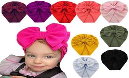 30Pcs Bulk Whole Solid Color Seersucker Waffle Fabric Turban Hats Baby Big Bowknot Beanies Top Knot Bonnet Caps Headwear P13 3756764