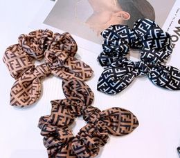 whole Retro Letter Printed Women Hair Rings Classic Bow Knot Pattern Lady Hair Rubber Bands High Elasticity Girl Pony Tail Hea6990658