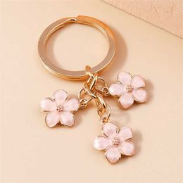 Keychains Lanyards Cute Sakura Pendant Keychain Simple Enamel Flower Tassel Keyring Women Girls Gift for Handbag Purse Bag Lovely Key Accessories