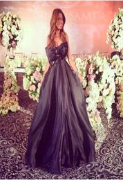 Fashion Sexy Formal Evening Celebrity Dresses 2018 A Line Black Taffeta Strapless Big Bow Party Dress Arabic Prom Gowns Floor 2287444