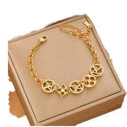 Titanium steel retro four-leaf clover bracelet exaggerated letter bracelet delicate niche retro vintag button stitching bracelet