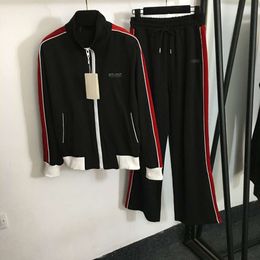 Sports Suit with Embroidered Letters on the Chest Standing Collar Long Sleeved Zippered Jacket and Elastic Waist Wide Leg Casual Pants
