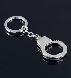 100pcslot Fashion Metal Handcuff Keychains Mini Handcuff Shaped Keyrings Key 2020new69780241208348