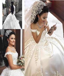 New Arabic Dubai Sexy OffShoulder Ball Gown Wedding Dresses Lace Appliques Capped Sleeves Cathedral Train Plus Size Bridal Gowns2387097