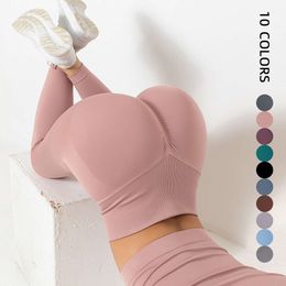 Nya Peach Hip Yoga Pants Womens Hip Lifting High midja Elastiska träningsbyxor Utomhus Running Fitness Pants