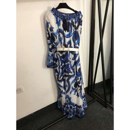 Womens Blue and White Porcelain Pattern Printed Metal Belt Waist Slanted Shoulder Mid Length Silk Dress