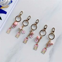 Keychains Lanyards Omamori Sakura Amulet Lucky Cat Keychain Cute Pendant Clothes Backpack Keyring Car Key Chains Charms Friend Birthday Gift