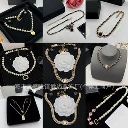 Pendant Necklaces Multiple options for European and American fashion and temperament in 2024. Celebrity palace diamond inlaid pearl letter necklace