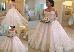 2018 Scoop Neck Aline Long Sleeve Lace Wedding Dresses Sweep Train Button See Through Back Bridal Wedding Gowns Shi6122618