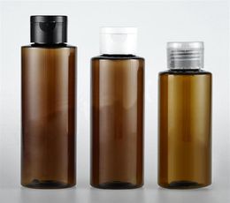 whole 50pcs ot 100 120 150ml brown flip top cap plastic bottle Cosmetic lotion cream PET container Travel shampoo bottles with lid7893610
