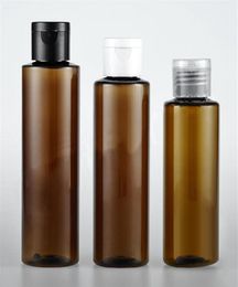 whole 50pcs ot 100 120 150ml brown flip top cap plastic bottle Cosmetic lotion cream PET container Travel shampoo bottles with lid2065515