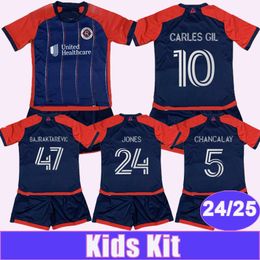 2024 25 New Revolution Kids Kit Soccer Jerseys CARLES GIL BORRERO KESSLER BUCK CHANCALAY Home Dark Blue Child Suit Football Shirt Short Sleeve Uniforms