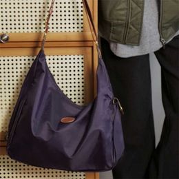 오프 소매 도매 95% 핸드백 고품질 여성 버전 문학 가방에 대한 클리어런스 나일론 럭셔리 크로스 바디 학생 캔버스 여자 가방 메신저 G0을위한 대학 스타일