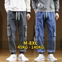 Плюс размер мужские грузовые джинсы Jogger Jeans Hip Hop Streetwear Многочисленные карманы растянутые хлопковые повседневные джинсовые брюки мешковатые брюки 8xl 240415