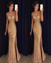 High Quality Gold Shinny Prom Dresses Sexy V Neck Cap Sleeves Major Crystal Beaded Sequins Side Slit Formal Evening Party Dress Ba7780240