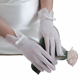 wg057 Exquisite Wedding White Bridal Gloves Elastic Mesh Bow Brides Fingertip Wrist Gloves Women Pageant Prom Accories d0YR#