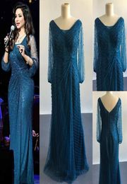 2017 Middle East Evening Dresses Major Beaded Sheer Sheath Long Sleeve V Neck Floor Length Celebrity Evening Gowns5317382