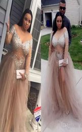 Sexy Rhinestones Beaded Plus Size Prom Dresses With Long Sleeves Sheer Jewel Neckline Formal Dress Floor Length Tulle Evening Gown5270559