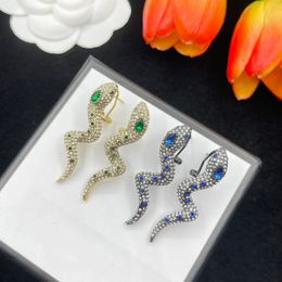 Luksusowe kolczyki stadniski projektanci Miedzika Wąż Dangle Charm 18K Złoty Srebrny Srebrny Kryształowy Rhinestone Uch Ear Stud For Women Fashion Biżuter Wedding Prezent