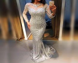 Major Beading Mermaid Prom Dresses Sheer Jewel Neck Silver Crystals Beaded Long Sleeves Evening Gowns Mermaid Shinning Girls Pagea1578729