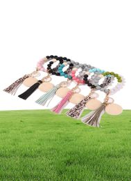 Keychains Womens Keyrings Wood Blank Disc Wristlet Key Ring Holder Silicone Bead Tassel Bracelet Bangle Keychain4998777