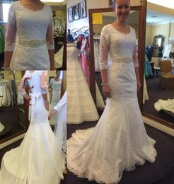 White Lace Mermaid Wedding Dresses with 34 Long Sleeves Scoop Neckline Beaded Sash Sweep Train Appliques Wedding Gowns Bridal Dre9651985