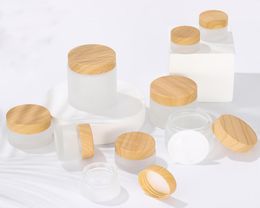 Frosted Glass Cream Cosmetic Jars Wax Cosmetics Packaging Bottle 5ml 10ml 15ml 30ml 50ml 100ml with Wood Grain Cap5444210