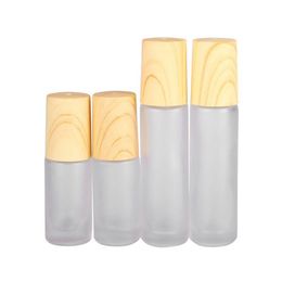 Roll On Bottles Wholesale 5Ml 10Ml Bottle Frosted Clear Glass Roller With Wood Grain Plastic Cap For Essential Oil Per Cosmetic Drop D Dhv5B