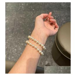 Beaded Top Designer Hand Chains Elegant White Pearls Chain Bracelets Punk Bracelet For Charm Lady Jewelry Fashion Women Planet Diamond Dhqov
