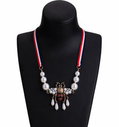 Whole Bohemian Fashion Crystal Pearl Bee Pendant Necklace Striped Ribbon Sweater Chain Women Charm Jewelry Accessories3160577
