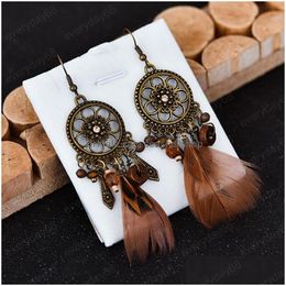 Dangle Chandelier Vintage Womens Wood Bead Long Feather Earrings Indian Jewellery Bohemia Bronze Flower Carved Hollow Round Hanging Drop Dhpgd